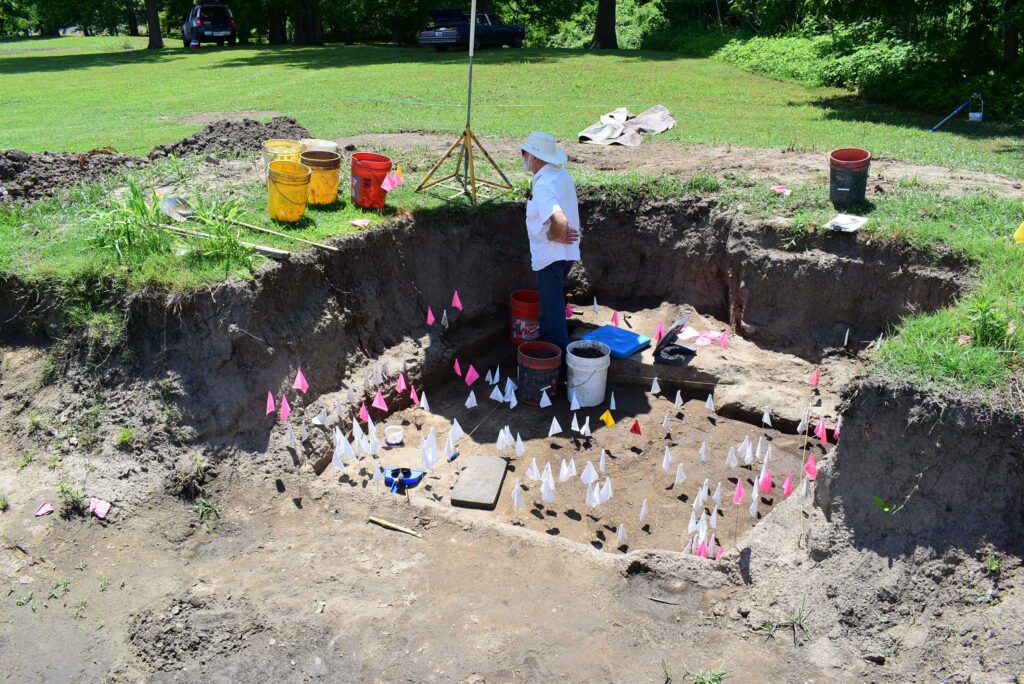 American Archaeologist standing